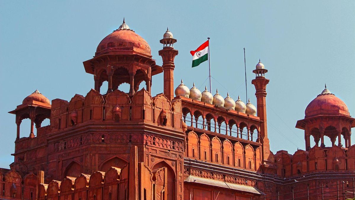 Indian National Flag Rising High On Red Fort